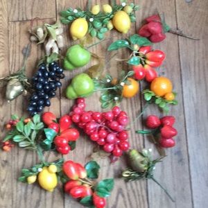 Assortment of plastic fruits for holiday decor.
